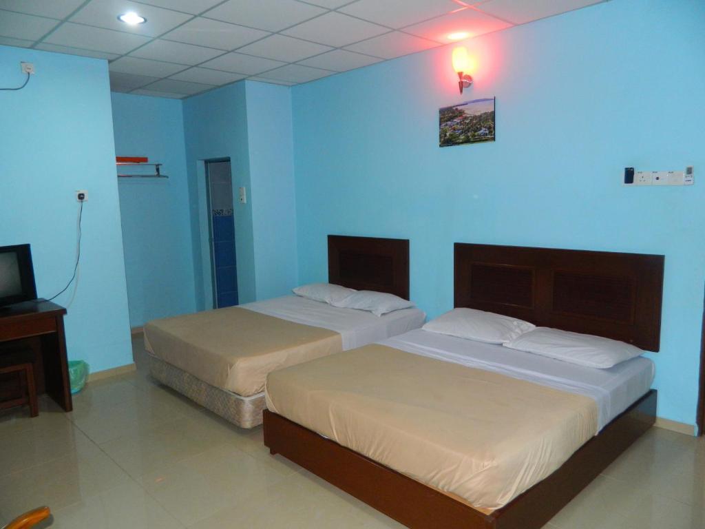 River Side Hotel Mersing Kamer foto