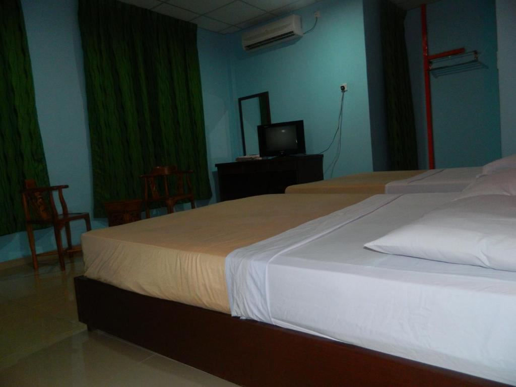 River Side Hotel Mersing Kamer foto