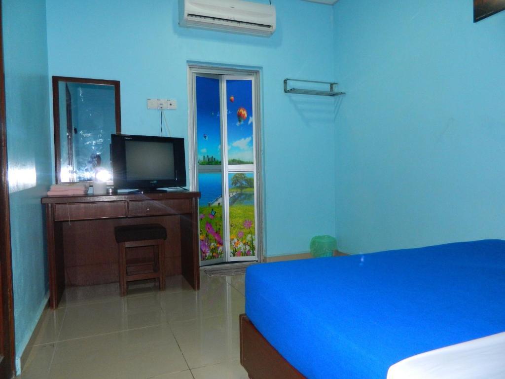River Side Hotel Mersing Kamer foto