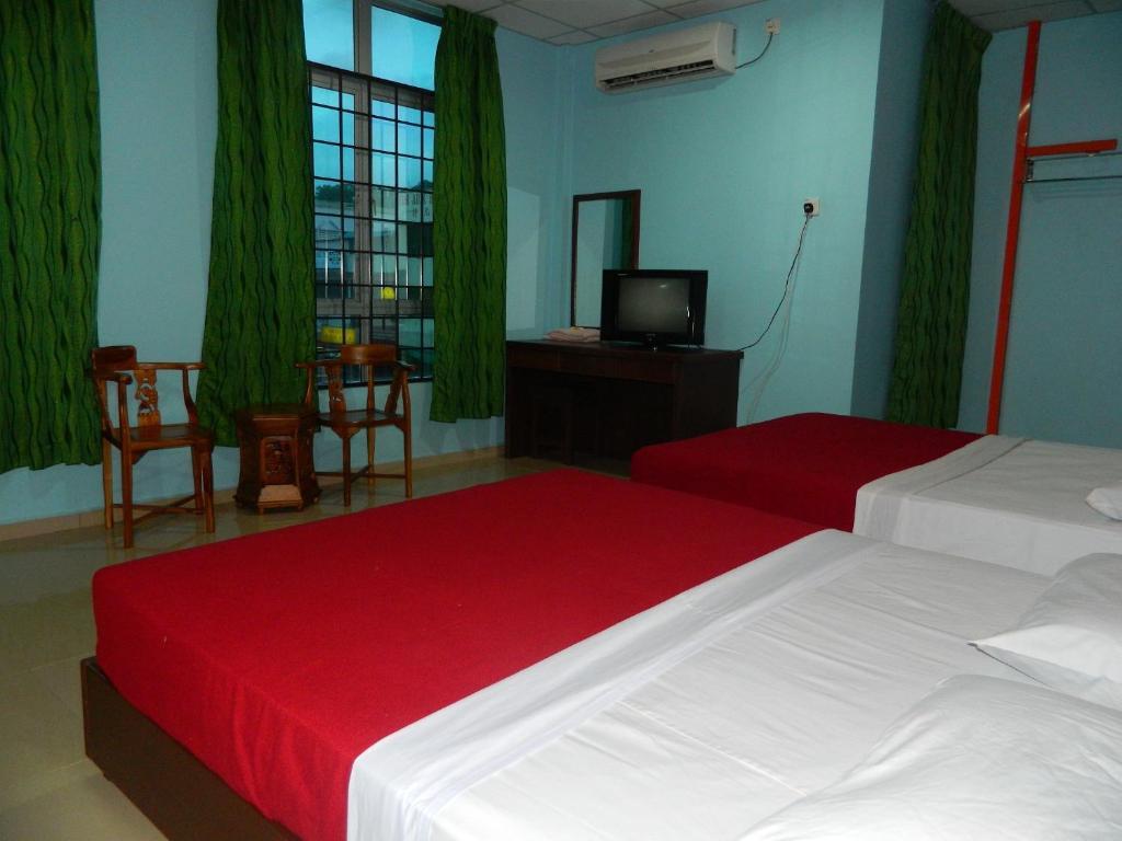 River Side Hotel Mersing Kamer foto