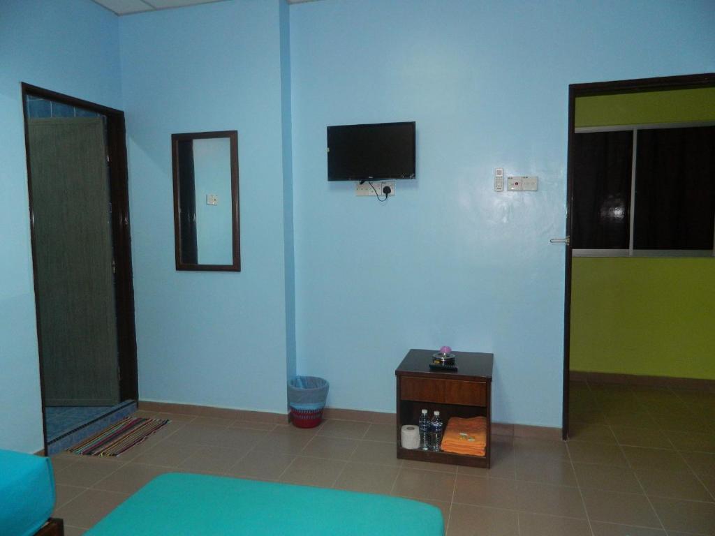 River Side Hotel Mersing Kamer foto