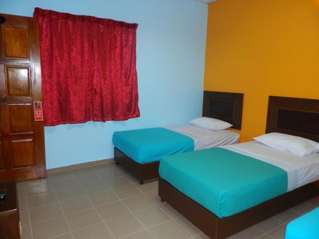 River Side Hotel Mersing Kamer foto